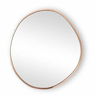 Veliko zidno ogledalo od okruglog šljunčanog ružičastog zlata