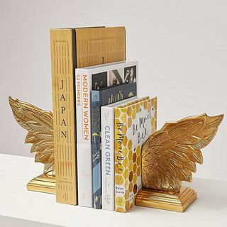 Zlatna knjiga s metalnim krilima završava